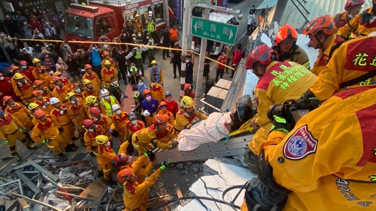 Emergency crews rescued four people who were trapped in a building that collapsed in Yuli. Credit: AFP Photo