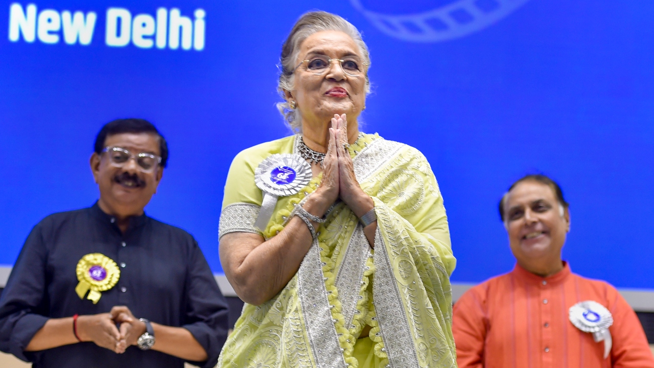 Dadasaheb Phalke Award winner Asha Parekh greets the audience during the 68th National Film Awards presentation ceremony. Credit: PTI Photo