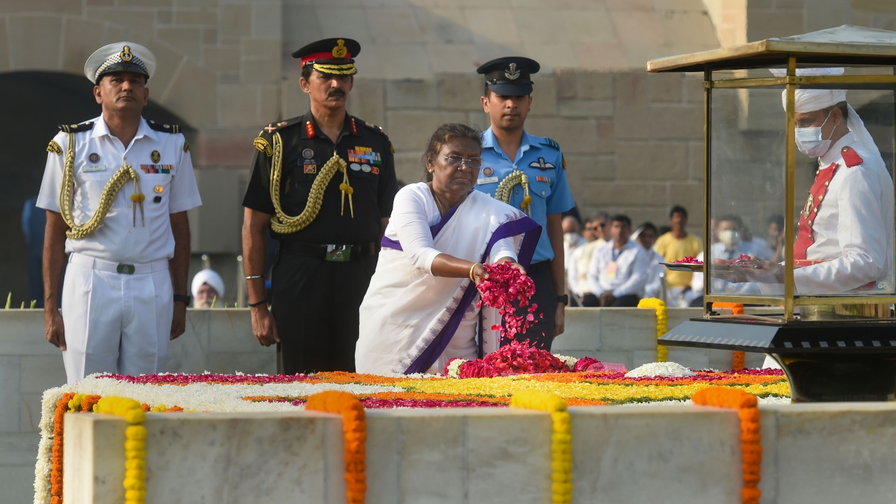 President Droupadi Murmu pays homage to Mahatma Gandhi on the occasion of his birth anniversary, at Rajghat in New Delhi. Credit: PTI Photo