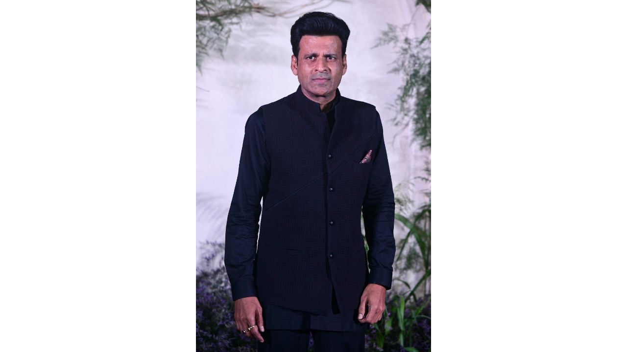 Manoj Bajpayee aced his all-black look at Richa Chadha and Ali Fazal's wedding reception. Credit: AFP Photo
