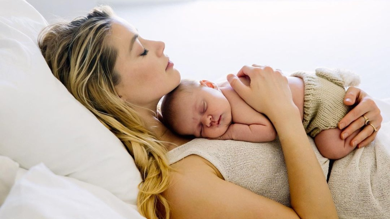 Hollywood star Amber Heard, who is currently in a relationship with cinematographer Bianca Butti, welcomed her first child, a baby girl, in April 2021 through surrogacy. She said her daughter was born on April 8 and has been named Oonagh Paige Heard. Credit: Instagram/amberheard