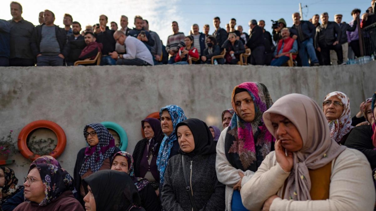 Mourners attend the funeral ceremony for Ridvan Acet, one of the miners who died after an explosion in a coal mine in Amasra, in Turkey's Bartin Province, on October 15, 2022. Credit: AFP Photo