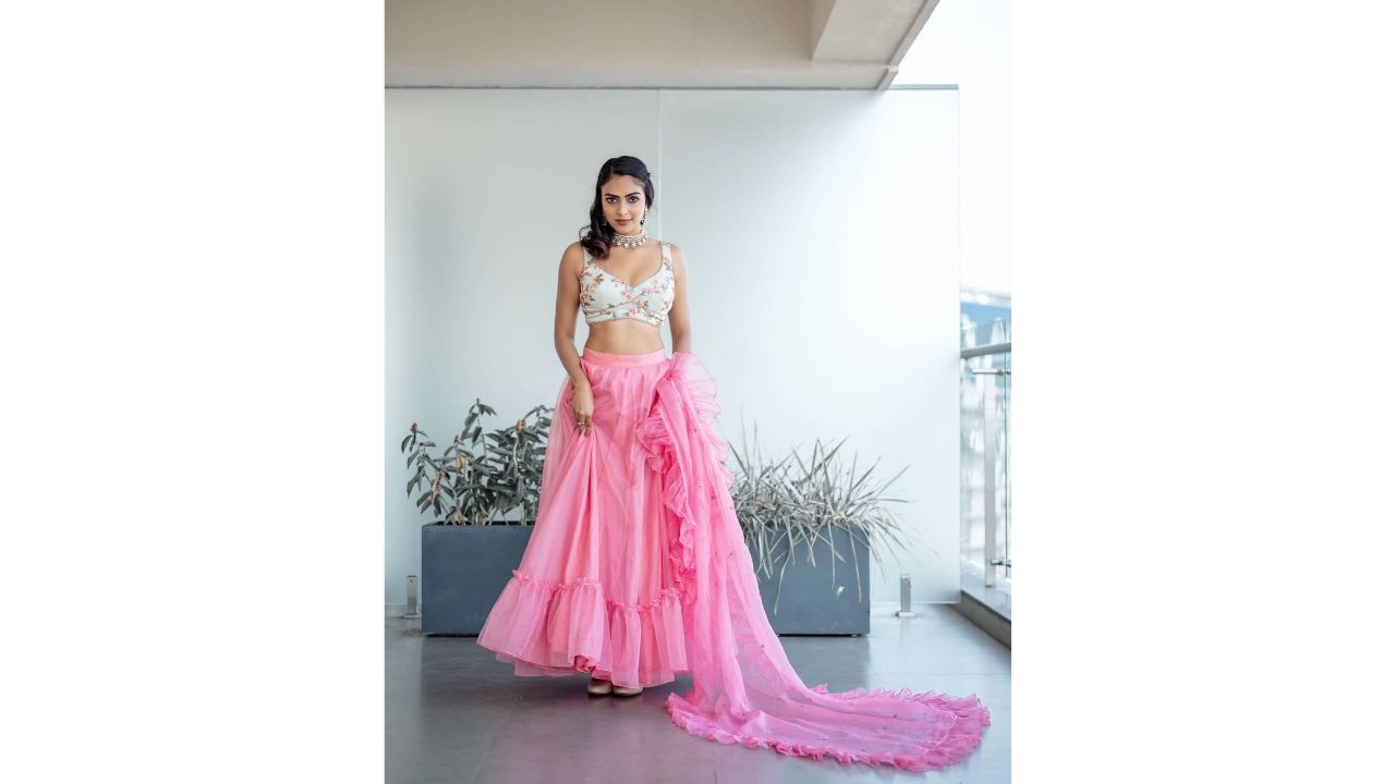 Actor Amala Paul wowed everyone in a floral print blouse and pink lehenga. Credit: Instagram/amalapaul