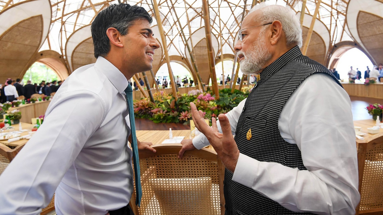 Prime Minister Narendra Modi with UK PM Rishi Sunak during a meeting on the sidelines of G20 Summit, in Bali, Indonesia. Credit: PTI Photo
