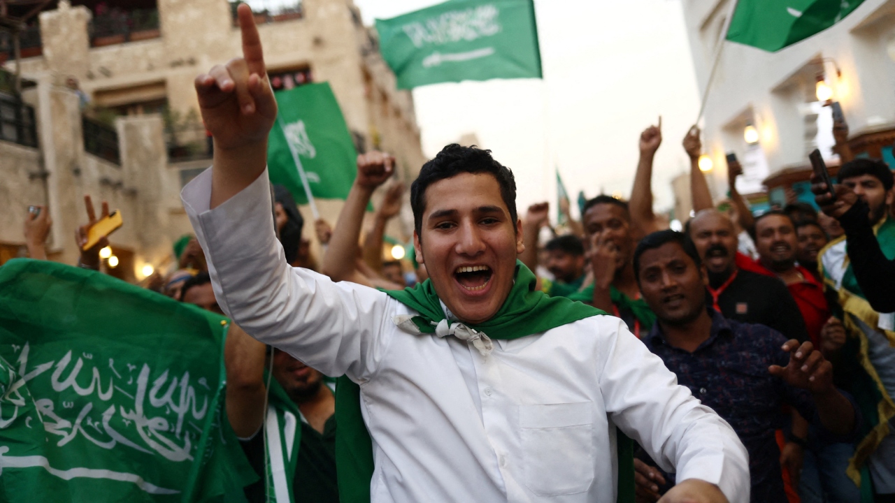 Saudi Arabia fans celebrate their team's win in Souq Waqif, Doha. Credit: Reuters Photo