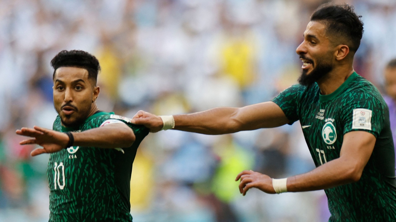 Saleh Al-Shehri bumped a low shot into the net in the 48th minute. Salem Al-Dawsari angled in a second goal, deflected by goalkeeper Emiliano Martinez, from the penalty area in the 53rd minute. Credit: AFP Photo