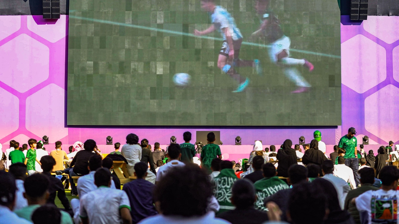 Crowds gathered in large numbers to watch the match on giant video screens at specially planned public viewings, holding their hands to their faces in disbelief as the Saudis overturned Argentina’s early lead and then jabbing their fists into the air after the game-winning goal. Credit: AFP Photo