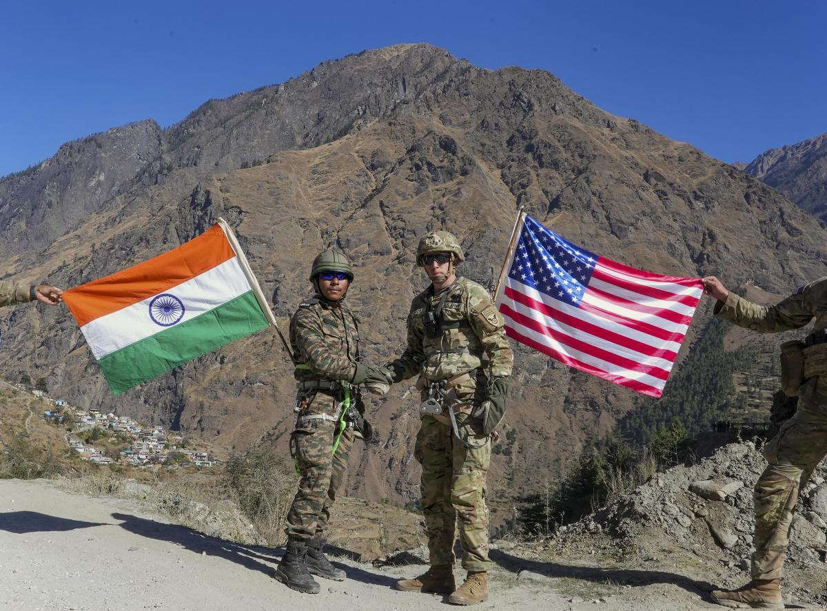 Indian and US Army personnel exchange greetings during a humanitarian and disaster relief exercise (HADR) amid the Indo-US joint exercise 'Yudh Abhyas', in Tapovan, Uttarakhand. Credit: PTI Photo