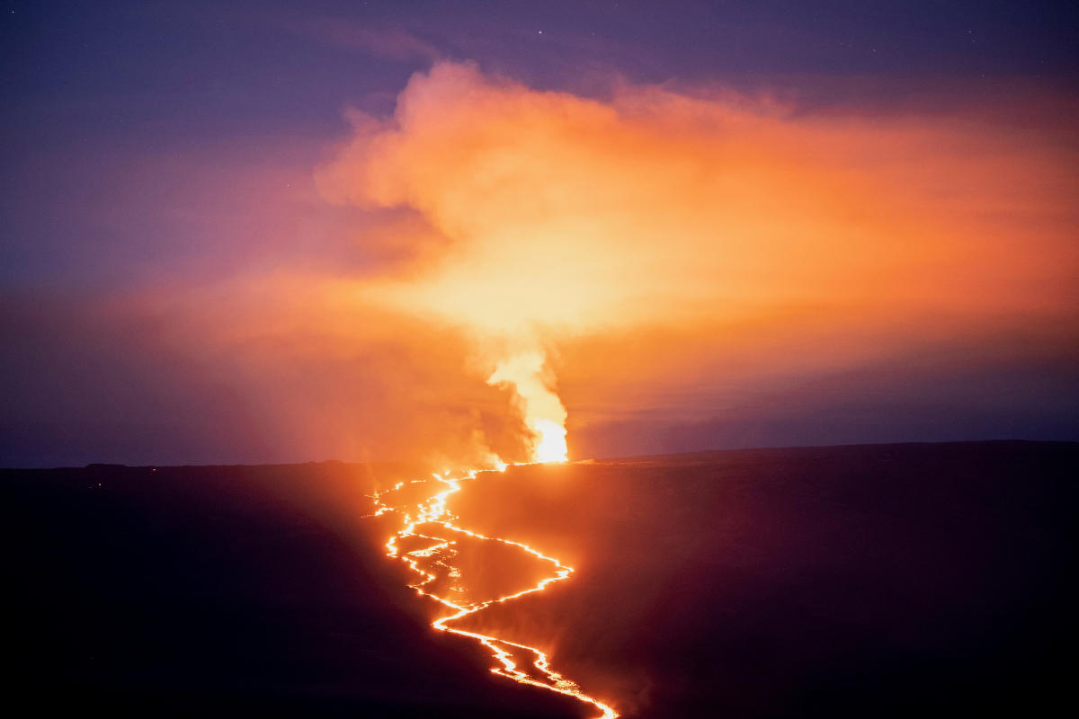 Lava fountains and flows illuminate the area with a glow during the Mauna Loa volcano eruption in Hawaii. Credit: Reuters Photo