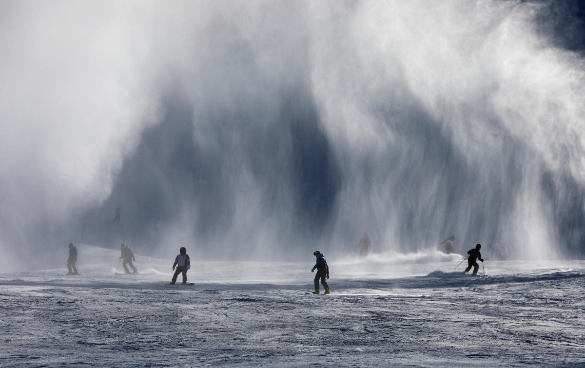 Skiers and snowboarders descend a slope at Shymbulak ski resort on the outskirts of Almaty, Kazakhstan. Credit: Reuters Photo