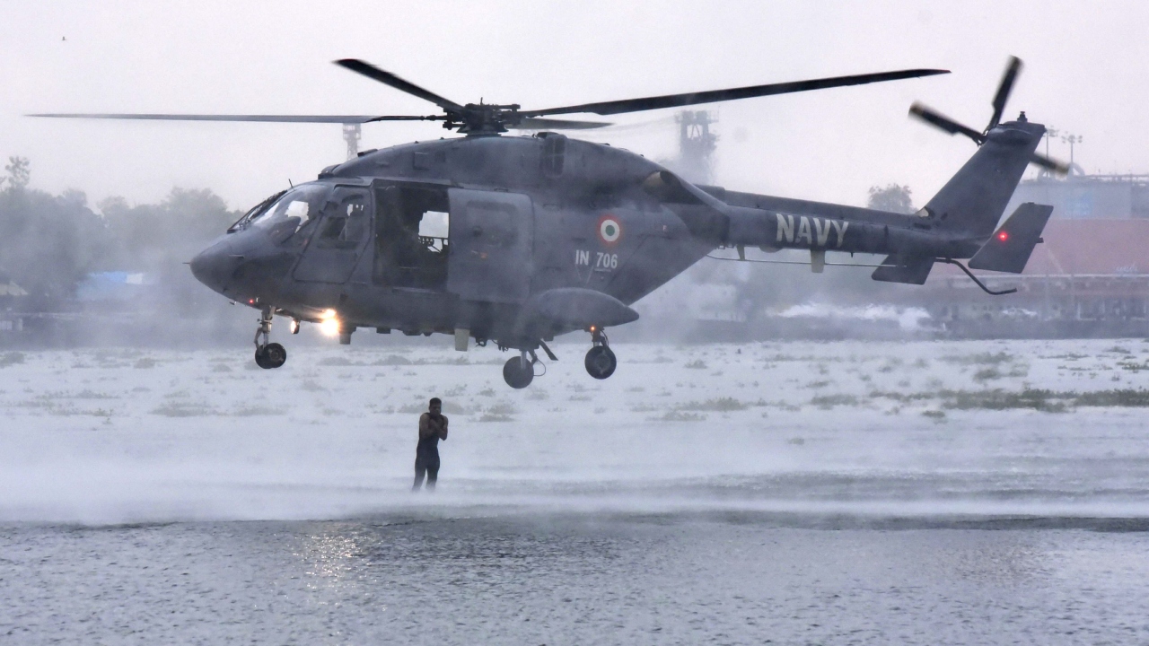 Navy personnel perform as part of the Navy Day celebrations in Kochi. Credit: PTI Photo