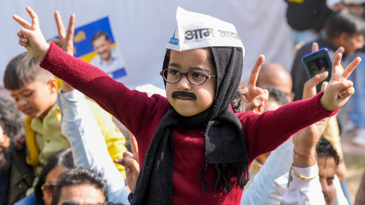 A child dressed as Delhi Chief Minister Arvind Kejriwal takes part in the celebrations of AAP's victory in the MCD polls, in New Delhi. Credit: PTI Photo