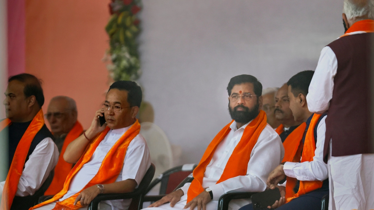 Maharashtra Chief Minister Eknath Shinde and others during the swearing-in ceremony of Gujarat Chief Minister, in Gandhinagar. Credit: PTI Photo