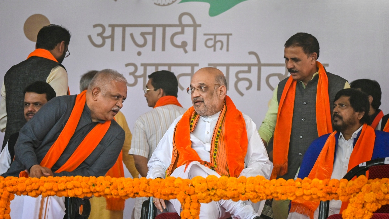 Union Home Minister Amit Shah, Union Minister Ramdas Athawale and others during the swearing-in ceremony of Gujarat Government, in Gandhinagar. Credit: PTI Photo