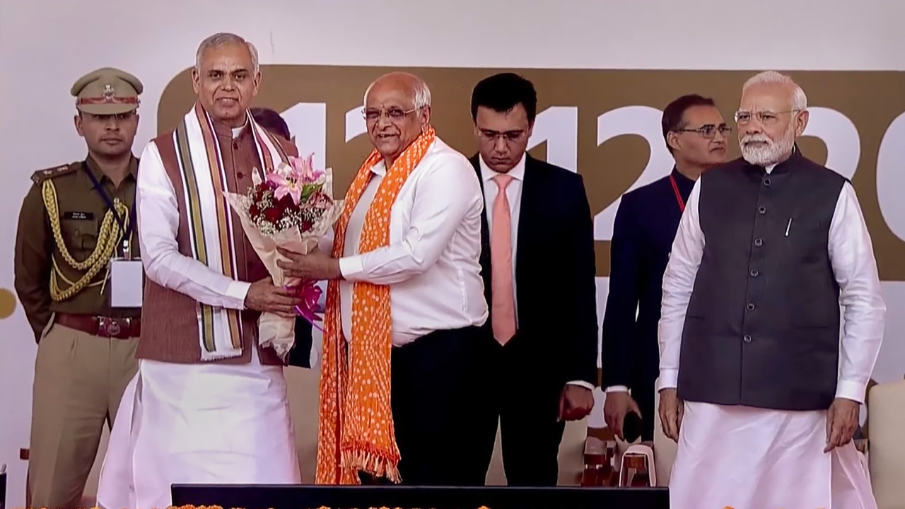 Patel was administered the oath as the 18th chief minister by Governor Acharya Devvrat at a function held at the Helipad Ground near the new Secretariat. Credit: Twitter/@BJP4India