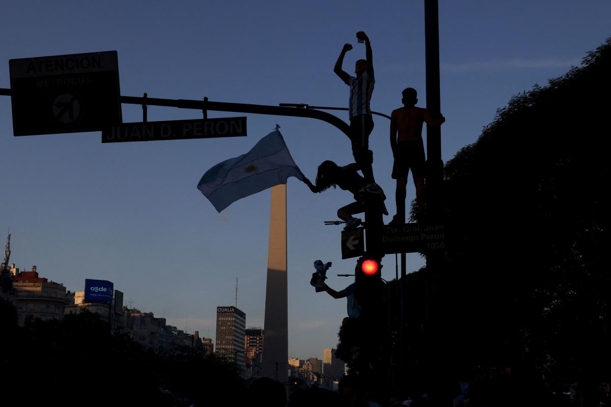 Watching Messi inspire Argentina to World Cup glory on Sunday made the economic suffering engulfing the country 'worth it', according to ecstatic fans. Credit: AFP Photo