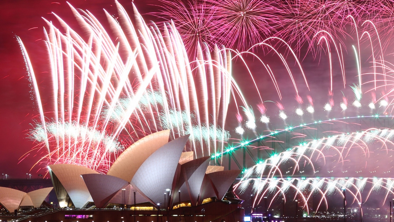 New Year's Eve fireworks lit up the sky over the Sydney Opera House and Harbour Bridge in Sydney. Credit: AFP Photo