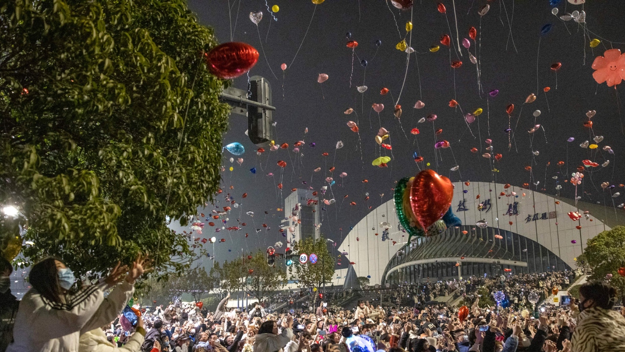 Revellers fly balloons during a New Year celebration in Wuhan, in China. Credit: AFP Photo