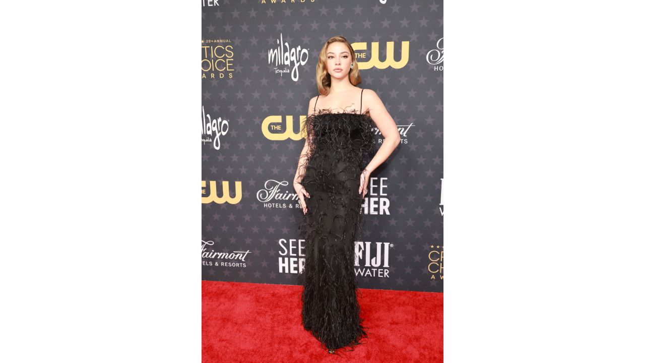 Madelyn Cline looked gorgeous in her feather-covered black gown by Givenchy. Credit: Reuters Photo