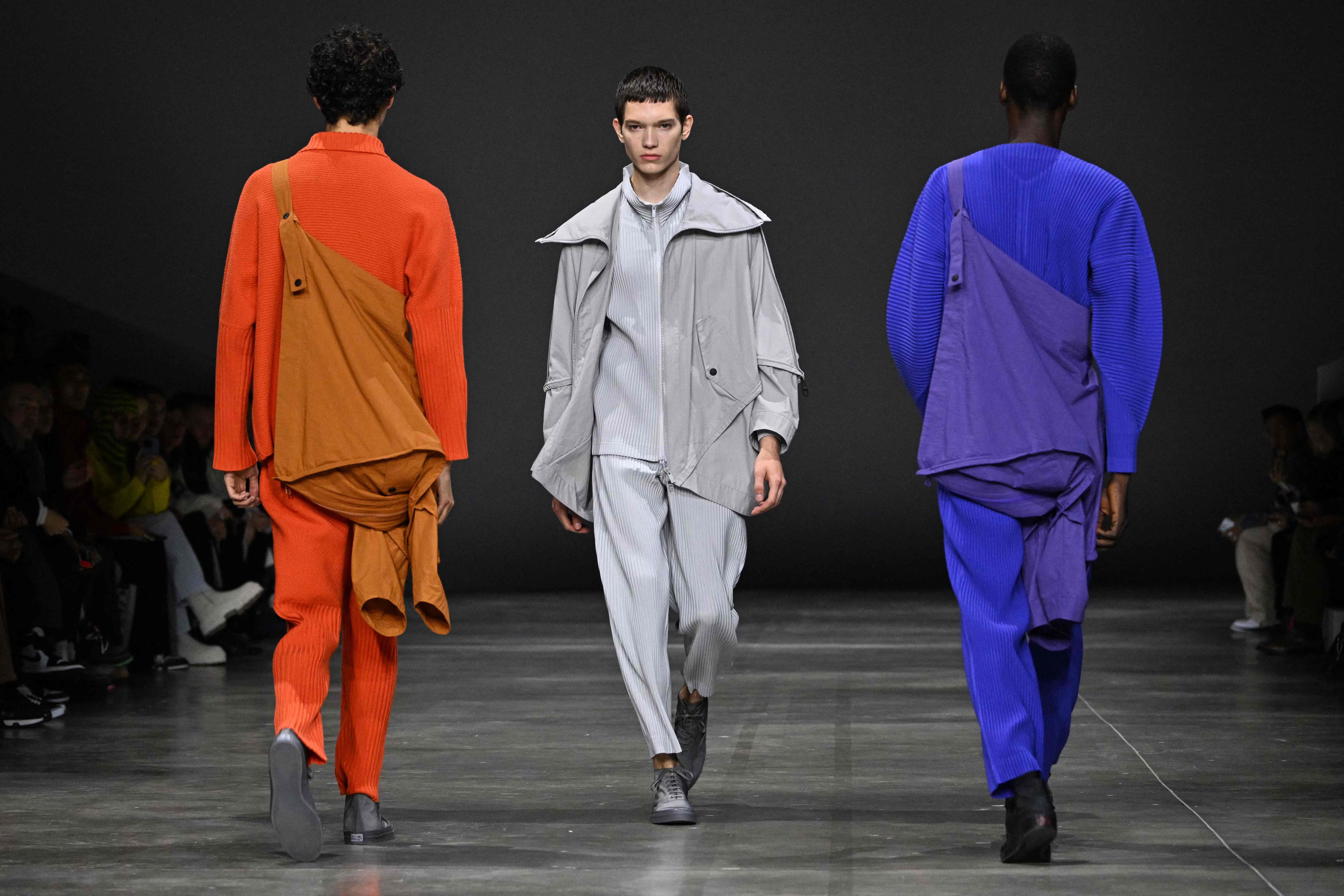 Models present creations during the Issey Miyake show as part of the Menswear Ready-to-wear Fall-Winter 2023-2024 fashion week in Paris. Credit: AFP Photo