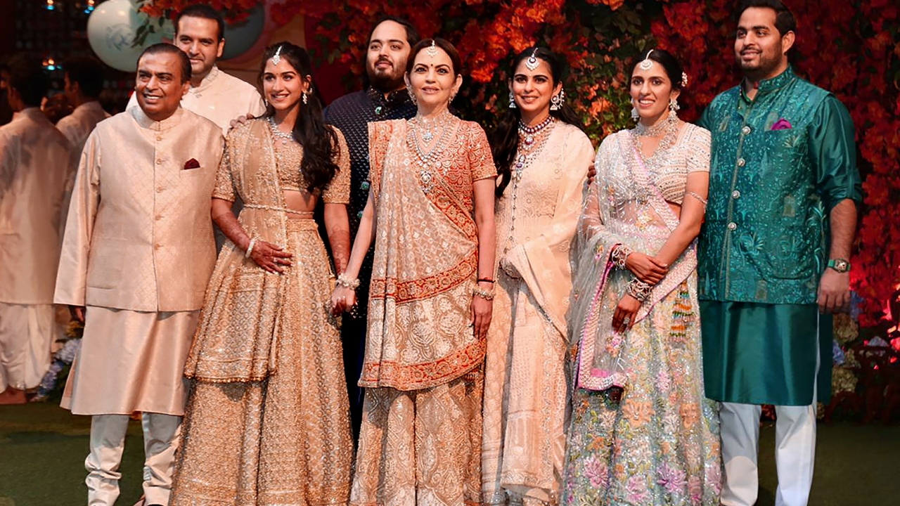 'Gol Dhana' which literally translates to jaggery and coriander seeds - is a pre-wedding ceremony in Gujarati tradition, akin to an engagement. These items are distributed at the groom's place where the event is organised. Credit: PTI Photo