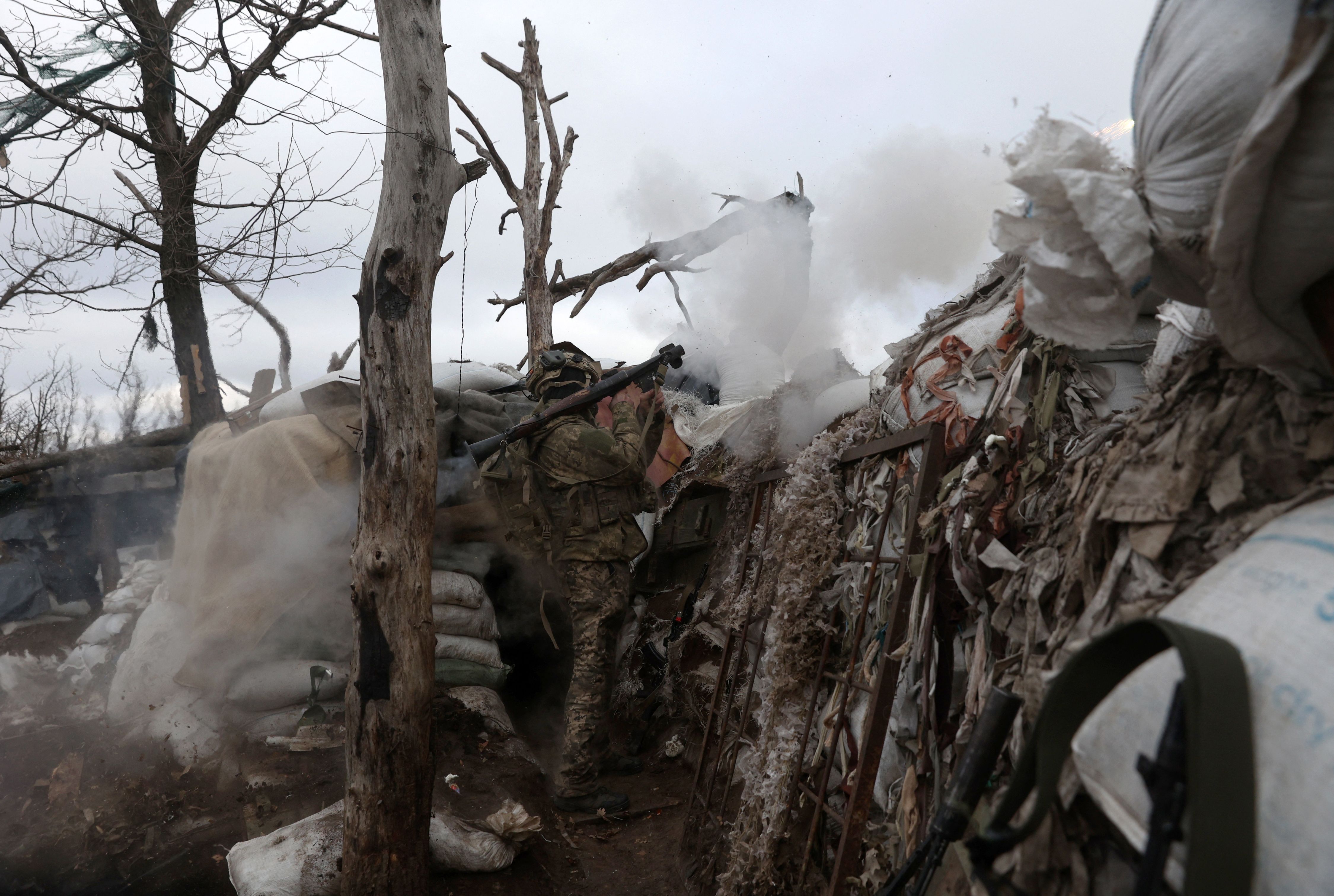 A Ukrainian serviceman fires an RPG towards a Russian position, on a frontline position in the Donetsk region. Credit: AFP Photo