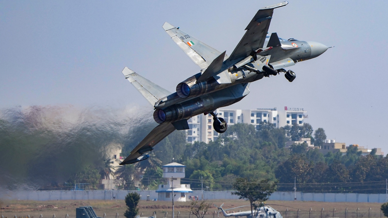 Su-30 aircraft flies past during the inauguration of Aero India 2023 at Yelahanka air base in Bengaluru. Credit: PTI Photo