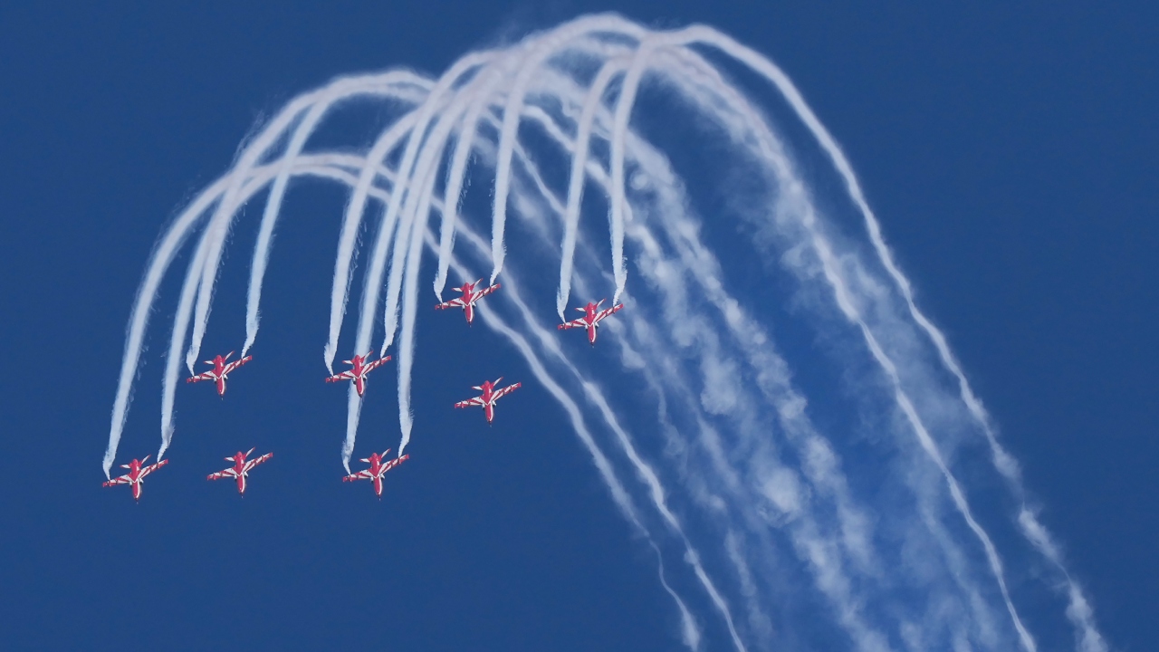 Suryakiran aerobatics team of the Indian Air Force (IAF) performs during the inauguration of Aero India 2023, at Yelahanka air base in Bengaluru. Credit: PTI Photo