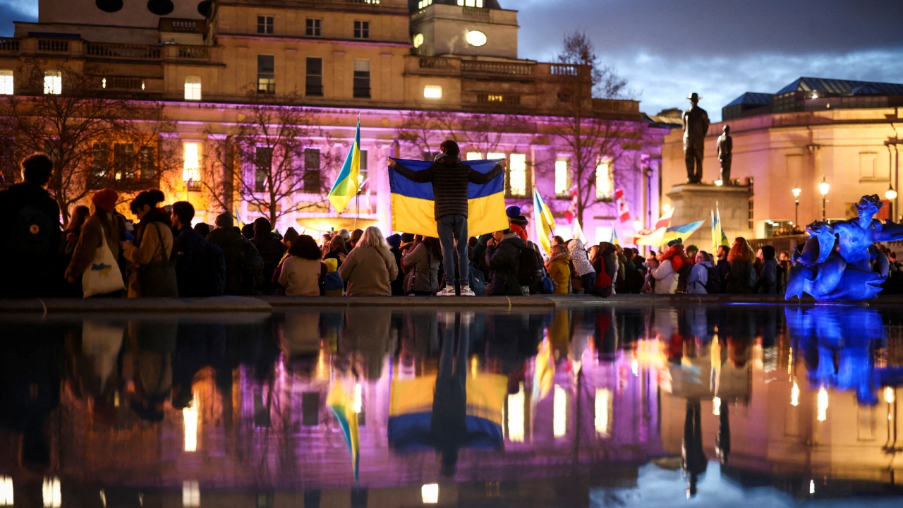People attend a vigil for Ukraine held on the anniversary of the conflict with Russia, at Trafalgar Square in London, Britain February 23, 2023. Credit: Reuters Photo
