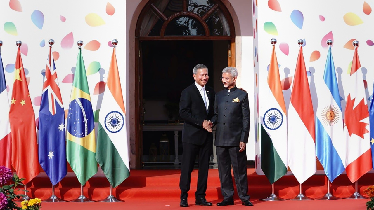 External Affairs Minister S Jaishankar welcomes Singapore's Foreign Minister Vivian Balakrishnan as the latter arrives to attend the G20 Foreign Ministers' Meeting, at RBCC in New Delhi. Credit: PTI Photo