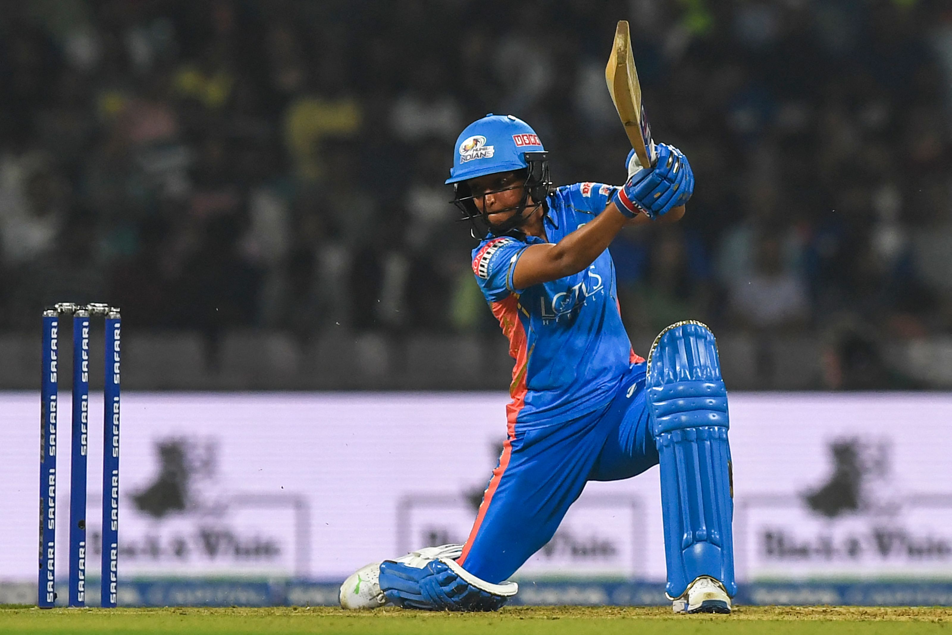 Mumbai Indians' captain Harmanpreet Kaur plays a shot during the 2023 Women's Premier League (WPL) Twenty20 cricket match between Gujarat Giants and Mumbai Indians. Credit: AFP Photo