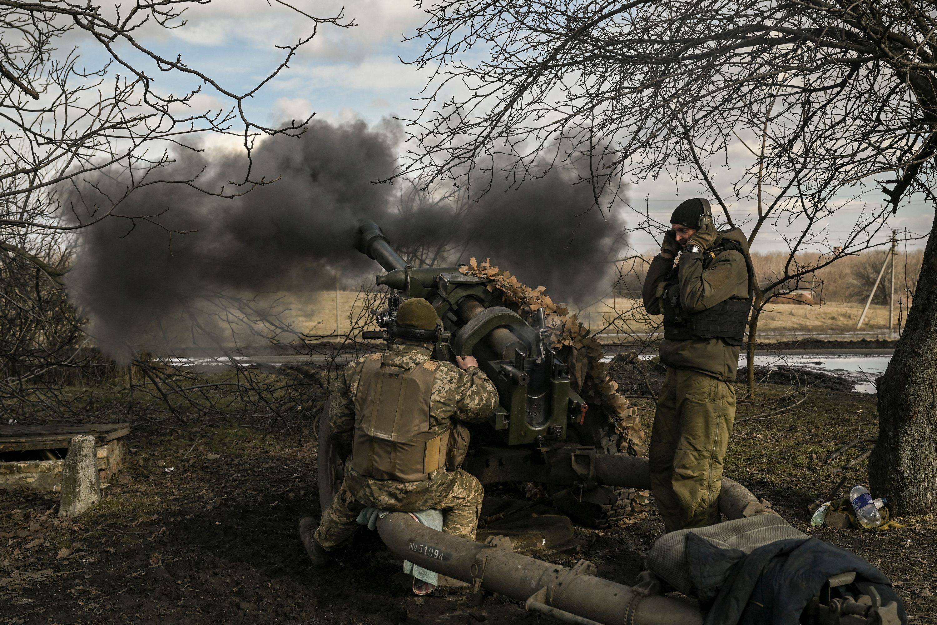 Ukrainian servicemen fire a 105mm Howitzer towards Russian positions, near the city of Bakhmut. Credit: AFP Photo