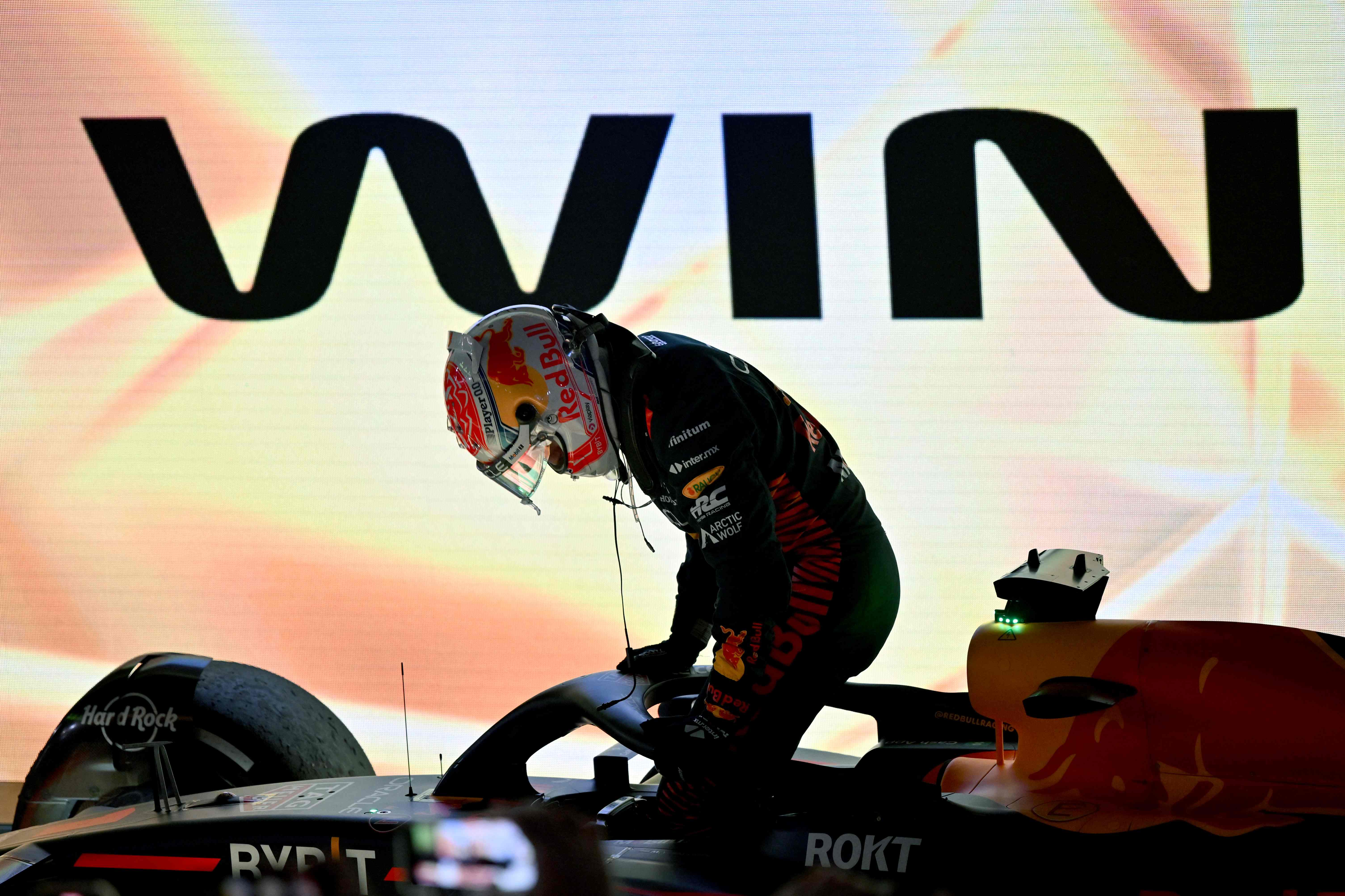 Red Bull Racing's Dutch driver Max Verstappen reacts as he exits his car after winning the Bahrain Formula One Grand Prix at the Bahrain International Circuit in Sakhir. Credit: AFP Photo
