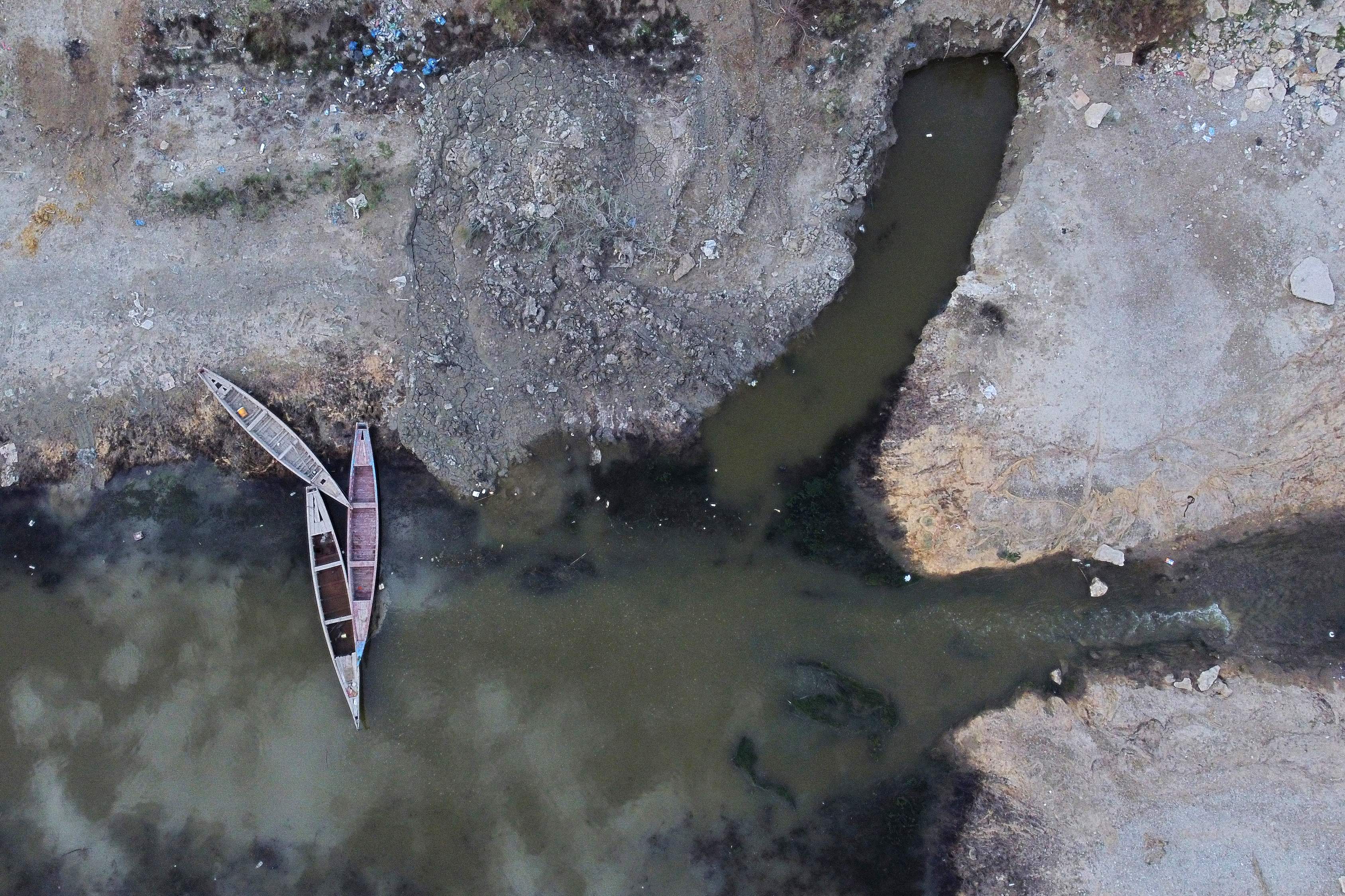 An aerial view shows the drought-induced drop in the water levels at the Abu Lehya river in the Dhi Qar province. Credit: AFP Photo