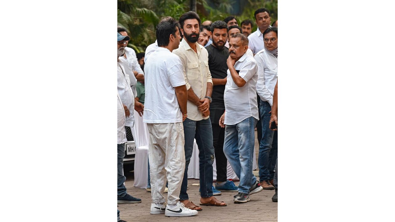 Ranbir Kapoor and Rohit Dhawan get clicked during the funeral of Satish Kaushik in Mumbai. Credit: PTI Photo