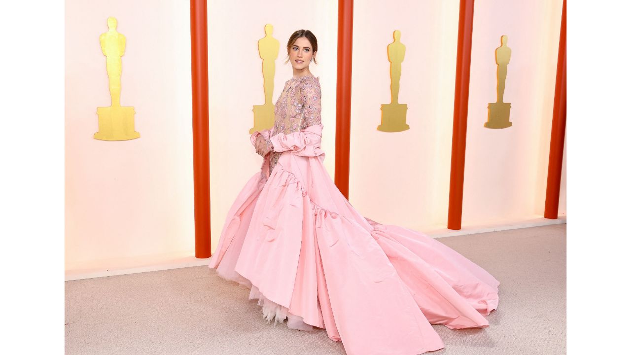 Allison Williams slayed the Oscars carpet in her sheer crystal-encrusted dress by Giambattista Valli, which she topped with a billowing pink satin coat. Credit: AFP Photo
