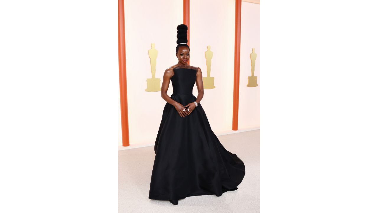 Danai Gurira, best known for her starring roles as Michonne on the AMC horror drama series, was seen in a black designer ensemble. She complimented her look with her gravity-defying hairdo — styled by Larry Sims. Credit: AFP Photo