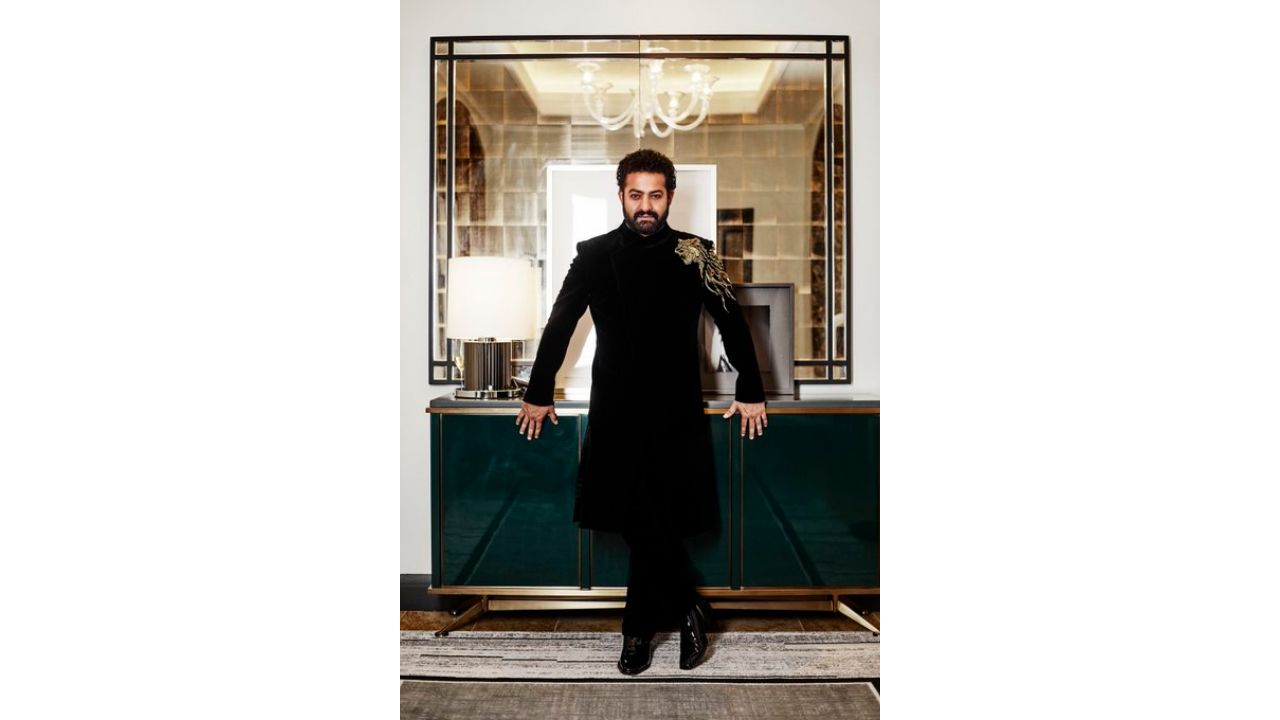 JR NTR wore a 'bandhgala' kurta featuring a gold embellished tiger motif on one shoulder and an angrakha-style neckline designed by Gaurav Gupta and styled by Ashwin Mawle and Hassan Khan. Credit: Twitter/@tarak9999