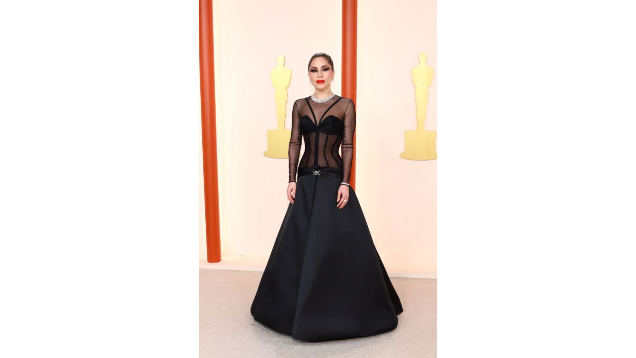 Everyone's favourite Lady Gaga kept it relatively simple in a sheer black Versace gown straight off the runway. Credit: AFP Photo