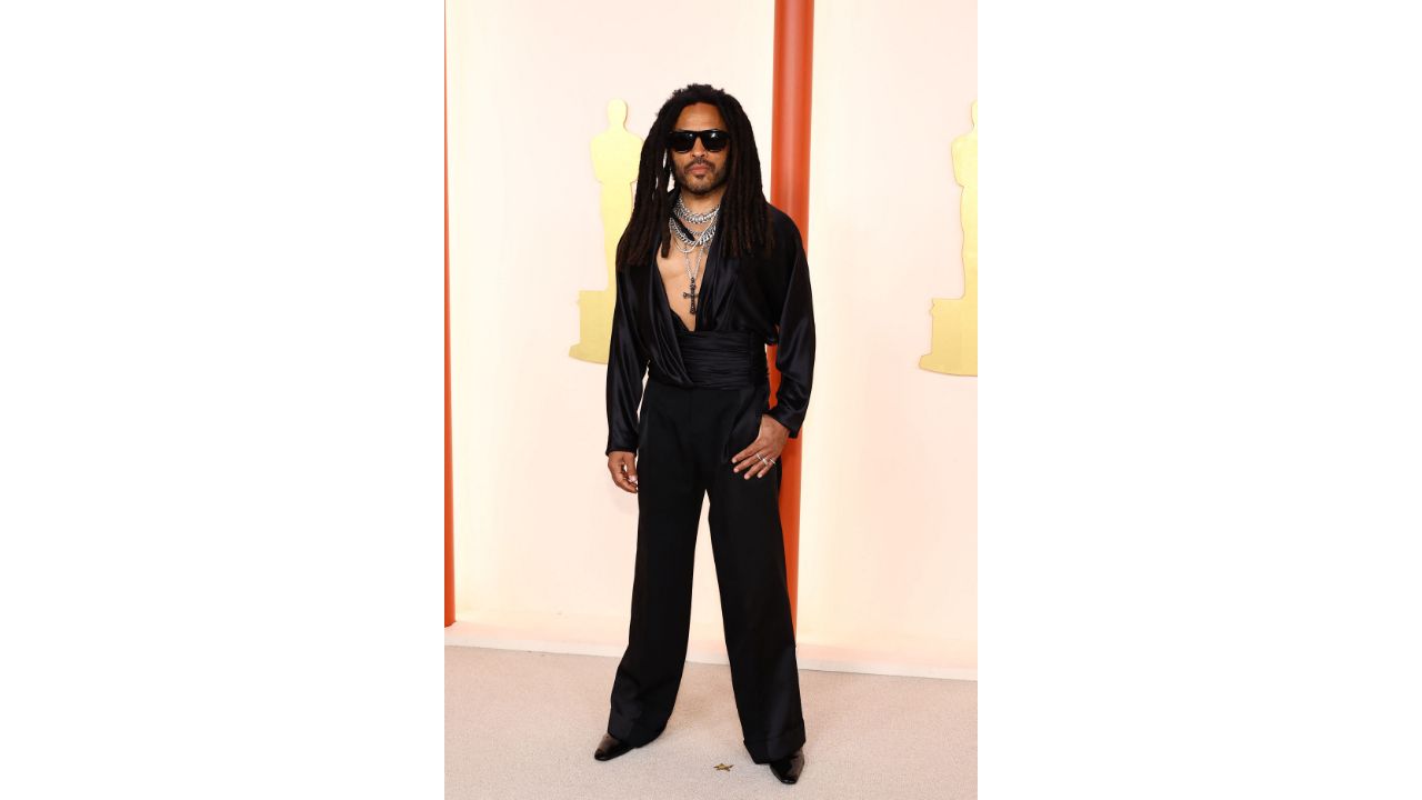 Rock star Lenny Kravitz showed up in a low-cut satin Saint Laurent top with lots of necklaces layered over his exposed chest. Credit: AFP Photo