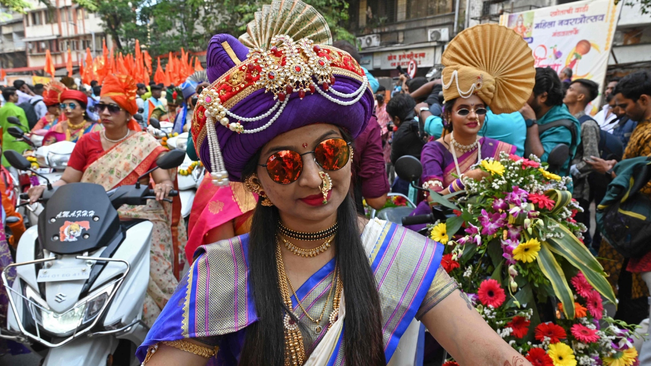 People also hoist 'gudis' at their houses to welcome the beginning of the traditional Marathi new year. Credit: AFP Photo