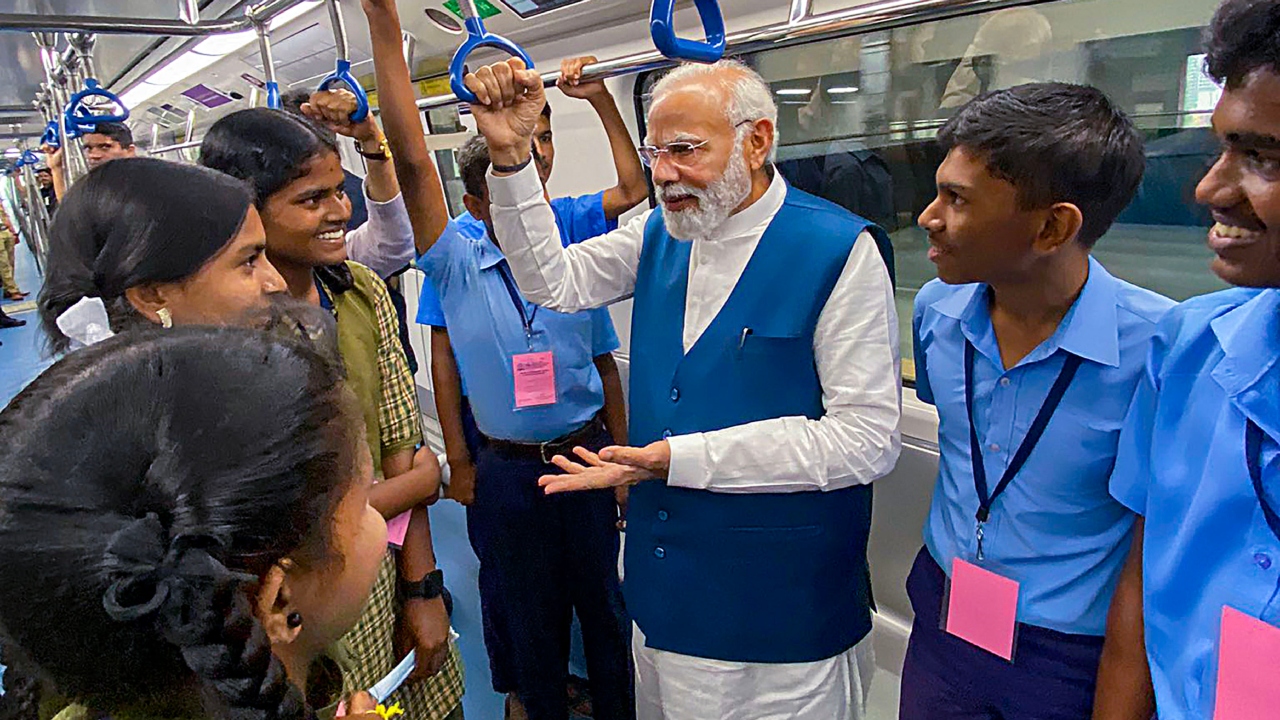 He then inaugurated Whitefield (Kadugodi) to KR Puram Metro Line in Bengaluru. The 13.71 kilometre stretch with 12 stations is built at a cost of Rs 4,249 crore. Credit: PTI Photo