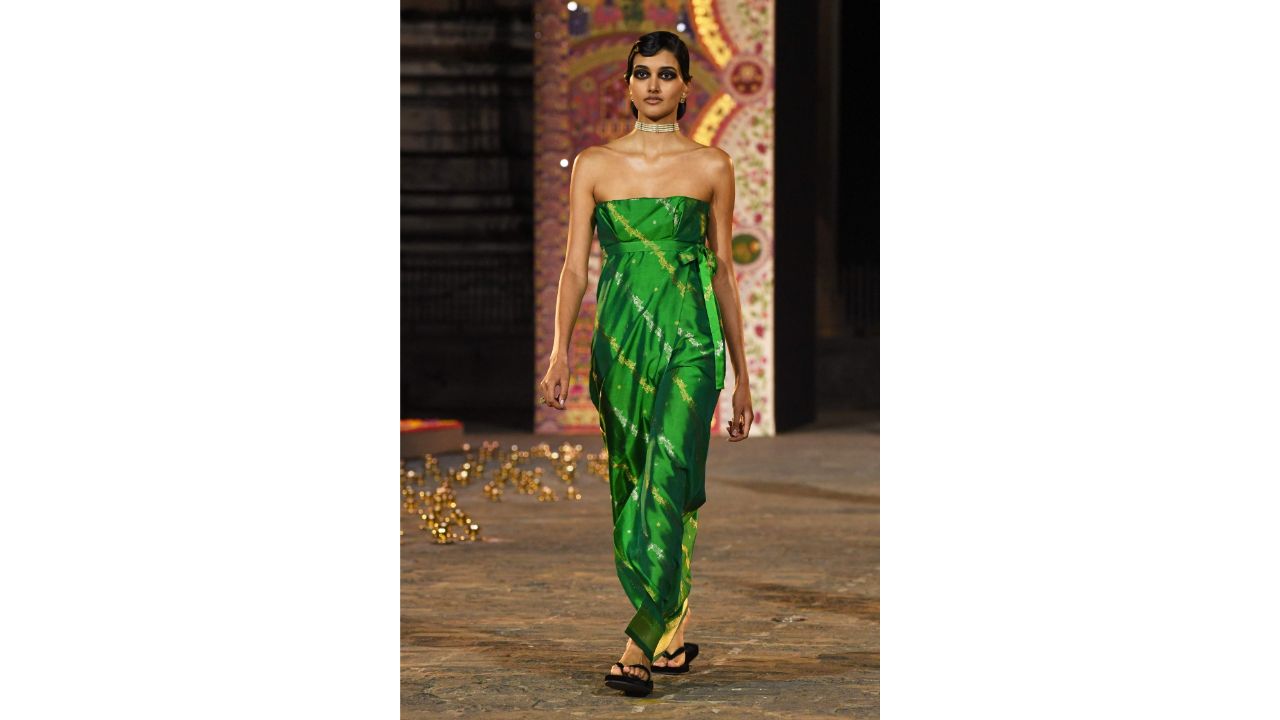 A model walks down the ramp in a creation from Christian Dior's Fall 2023 collection during a fashion show in Mumbai. Credit: AFP Photo