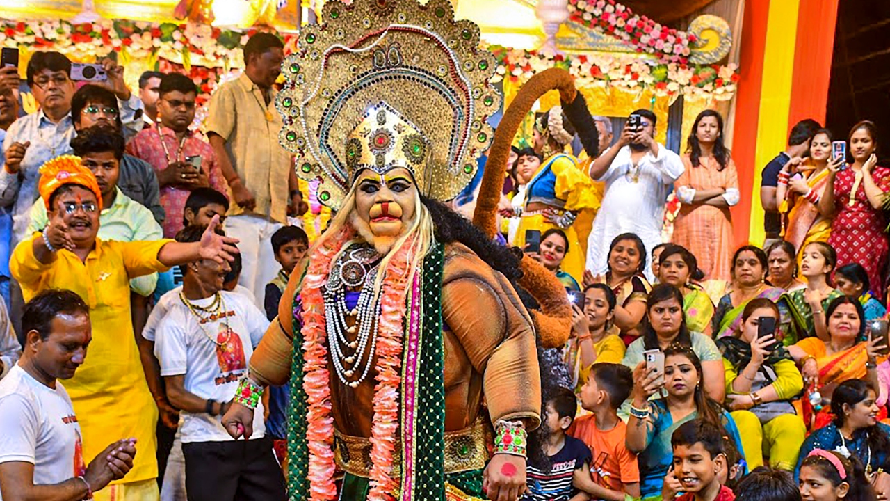 An artist dressed as Lord Hanuman perform at the religious programme on the occasion of 'Hanuman Jayanti', in Kanpur. Credit: PTI Photo