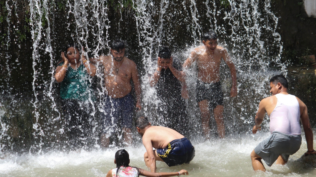 Take Cool Showers: Take cool showers or baths to soothe your skin and reduce sweat and oil buildup that can clog your pores. Credit: PTI Photo