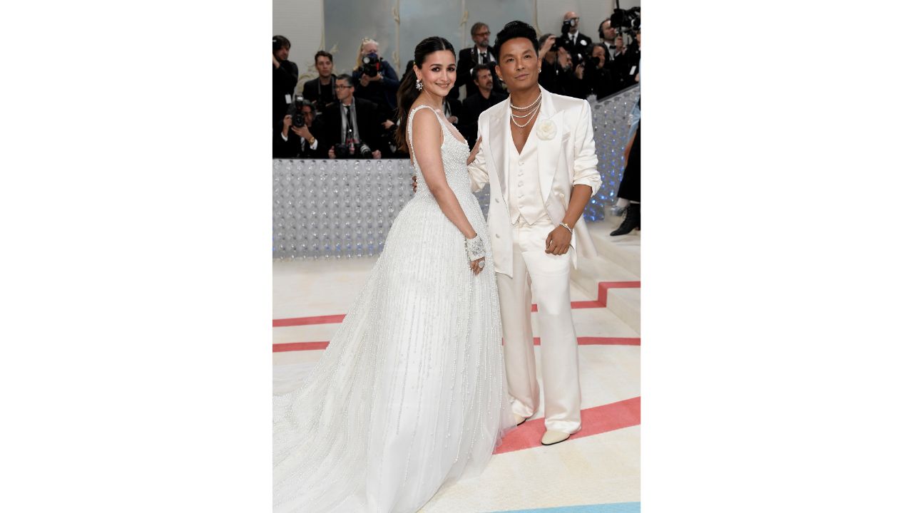 Alia Bhatt poses with designer Prabal Gurung as  she arrives for The Metropolitan Museum of Art's Costume Institute benefit gala celebrating the opening of the