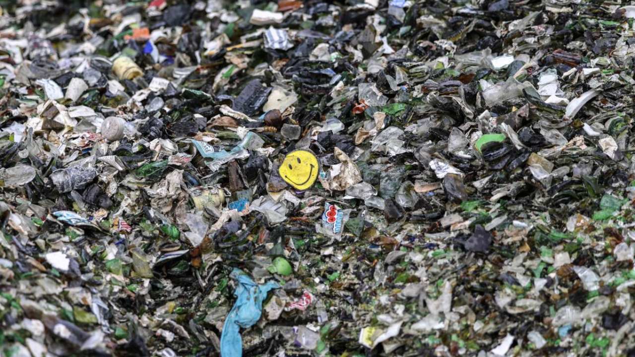 This photograph taken on April 27, 2023, shows a pile of glass waste at a waste disposal site in Saint-Juery, southwestern France. Credit: AFP Photo