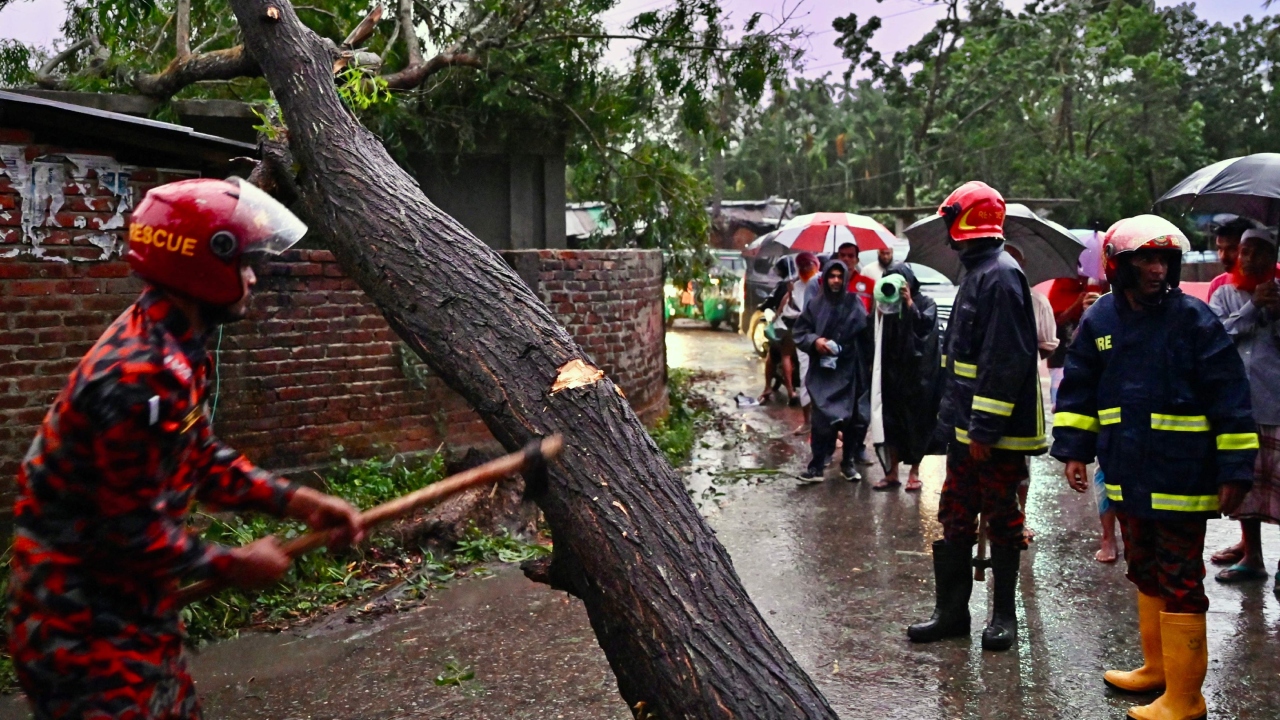 Seawater raced into more than 10 low-lying wards near the shore as Cyclone Mocha made landfall in Rakhine state Sunday afternoon, he said. Residents moved to roofs and higher floors, while the wind and storm surge prevented immediate rescue. Credit: AFP Photo