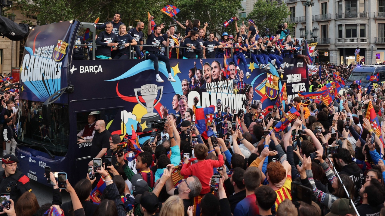 FC Barcelona players celebrate their win with fans during the victory parade. Credit: AFP Photo