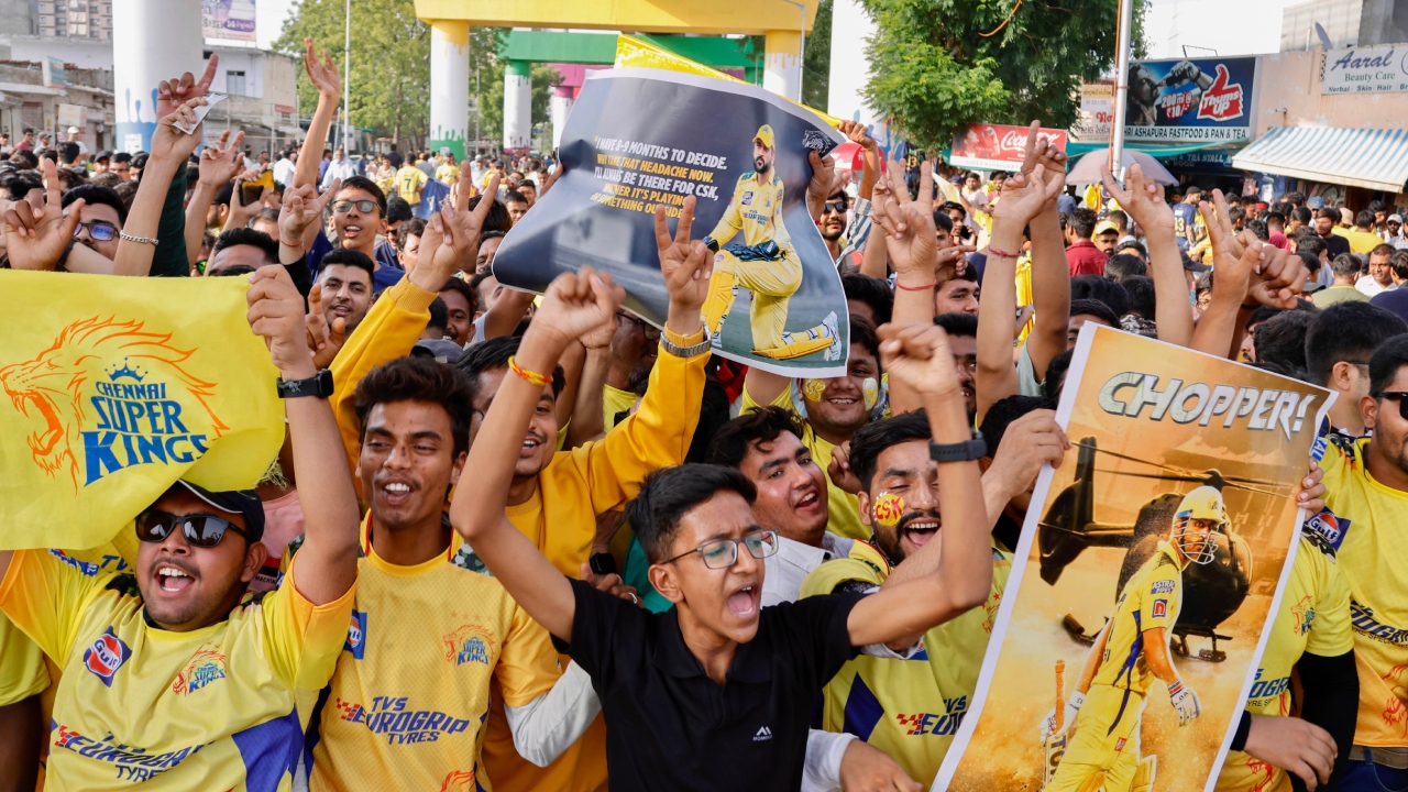 CSK fans arrive in large number at the Narendra Modi Stadium ahead of Indian Premier League’s (IPL) final match between Chennai Super Kings and Gujarat Titans, in Ahmedabad. Credit: PTI Photo